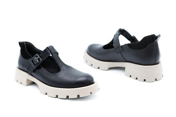 Sneakers. Sandals. Pair of fashionable patent leather shoes isolated on white background. View from all sides.