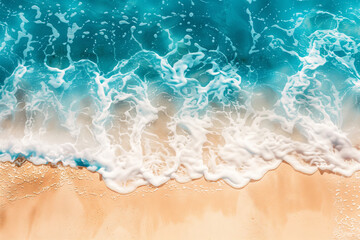 Naklejka premium Abstract background with a beautiful sand beach and blue water waves, summer concept for vacation banner with copy space, in the top view.
