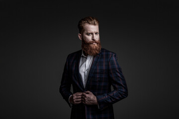 Gentleman menswear. Bespoke suit. Bearded man in tailored formal menswear. Man businessman in bespoke formalwear. Business man in elegant tailored suit. Formal tailored suit. Personal style