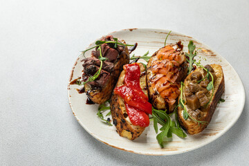 different types of bruschetta. With salmon, meat, soft cheese, herbs