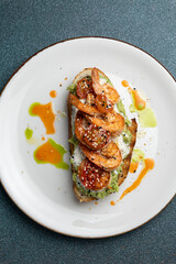 Delicious bruschetta with shrimp, cheese and herbs