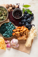 Adaptogen healthy food. Herb and spice collection on light background