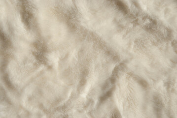 White fur texture background. White fur close up. Artificial white fur.