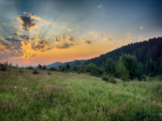 Wonderful landscape view on the Carpathian Mountains during the sunset in the summer season 