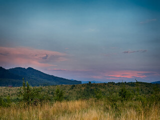 Wonderful landscape view on the Carpathian Mountains during the sunset in the summer season 