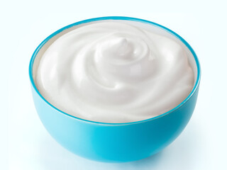 cream sour in  blue bowl isolated white background. Reference for design