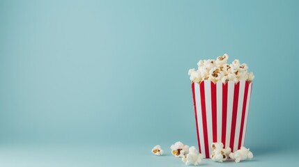 Popcorn in a Red and White Striped Bucket