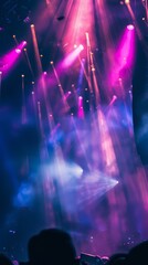 Obraz premium Dazzling Stage Lights and Blurred Party Vibe at a Concert, Capturing the Electrifying Energy of a Live Performance