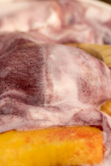 natural yogurt in a white bowl with fruits