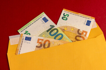 new yellow paper envelopes with euro cash