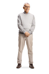 Cheerful elderly man sitting and smiling