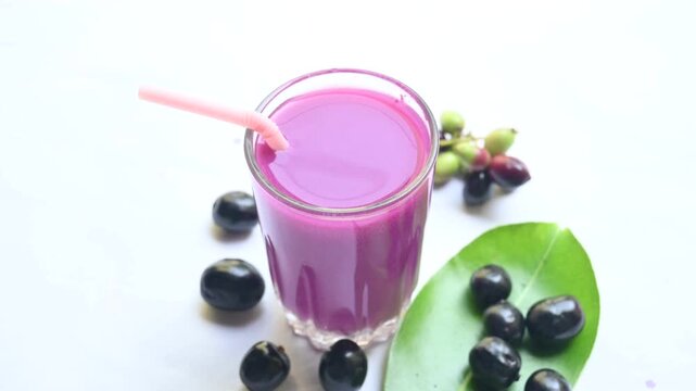 Syzygium cumini fruits juice. Its other names Malabar plum, Java plum, black plum, jamun and  jambolan. This fruit have anti diabetic properties. Indian jamun juice. Healthy drink. Fruit juice.