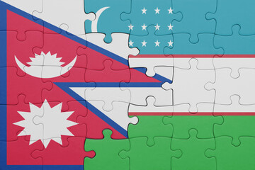 puzzle with the colourful national flag of nepal and flag of uzbekistan .