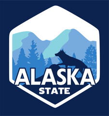 state of alaska with the silhouette of a wolf