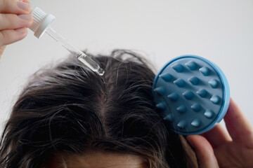 Scalp massage oil to accelerate hair growth, providing essential nutrients and promoting healthy...