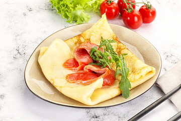 Russian pancake with salmon fish
