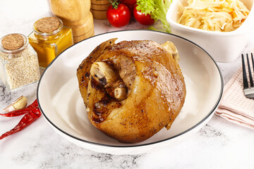 Baked pork knee with spices
