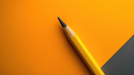 Yellow pencil on dual toned background with abstract concept Blank area for text sample design