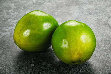 Two ripe green exotic avocado fruit