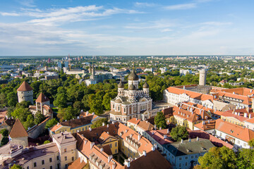 Fototapeta premium Aerial view of Alexander Nevsky Cathedral in Tallinn Old Town on a sunny summer morning. St. Mary's Cathedral, defensive walls, rooftops.