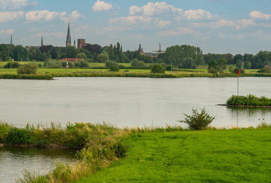 Skyline of Culemborg, Province Gelderland, with river Lek in the foreground