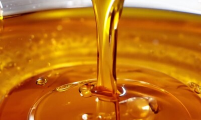 Golden Liquid Pouring - Powered by Adobe