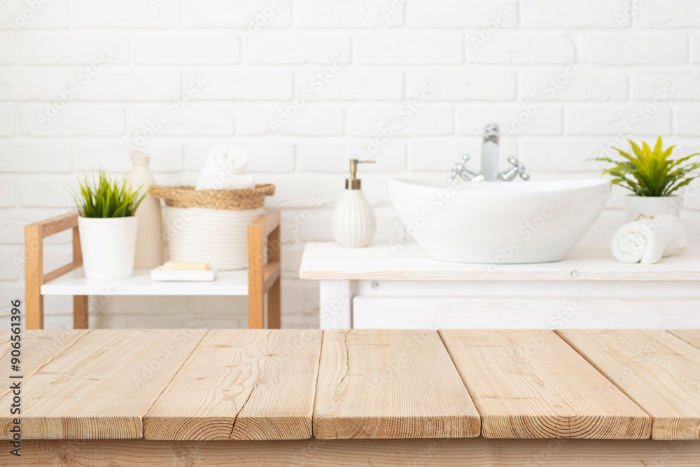 Sticker Table top from wooden planks for product display in blurred spa bathroom interior background