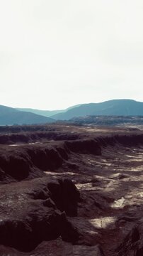 black volcanic basalt rock formations in the low light