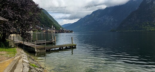 peaceful view of small village beside a stunning lake