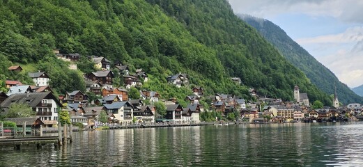 peaceful view of a small town Hallstatt in Austria beside a stunning lake