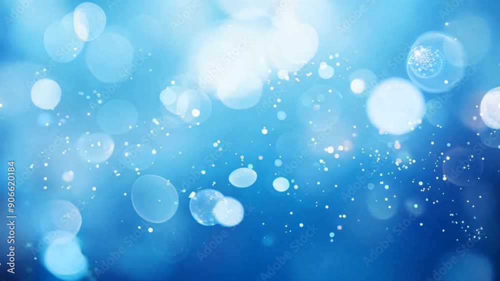 Poster A close-up photo of a bright blue bokeh background with soft, out-of-focus lights. The background is smooth and dreamy, with no visible imperfections. The overall effect is serene and calming.