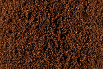 Texture of ground coffee close-up: top view