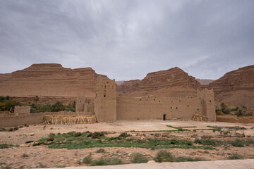 Fototapeta na wymiar Ancient Kasbah of Ifri located in Morocco, in the valley of the Ziz River in the middle of the Middle Atlas mountain range in North Africa. Construction made with adobe that blends in with the terrain
