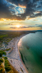 Aerial view of beautiful serene beach Koral and Camping Yug on the Black sea in Bulgaria. Camping with trailers near remote beach popular among surfers, beautiful landscape © Krasimir