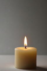 burning candle in the dark