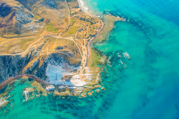 Punta Bianca, near Agrigento in Sicily Italy. Beach with ruins of an stone house on white cliffs.