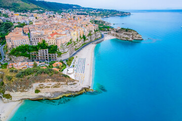 Fototapeta premium Tropea, Calabria, Italy. Church of Santa Maria dell'Isola. Monastery and coastline with azure crystal-clear water