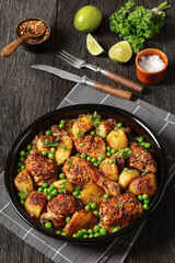 Chicken Vesuvio in a baking dish, top view