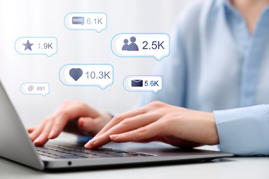 Content manager. Woman working on laptop indoors, closeup. Likes, followers, e-mails, messages and adding to favorite notifications over device