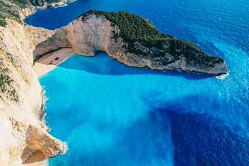 Naklejka premium Zakynthos, Greece. Navagio Beach with sjipwreck in Ionian Sea. Beautiful views of azure sea water and nature with cliffs cave. Boat trip