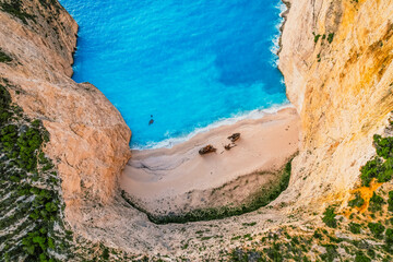 Zakynthos, Greece. Navagio Beach with sjipwreck in Ionian Sea. Beautiful views of azure sea water and nature with cliffs cave. Boat trip