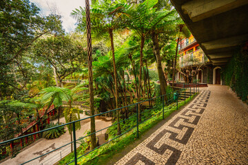 Monte Palace, Tropical Garden with Waterfalls, Lakes and traditional buildings above the city of...