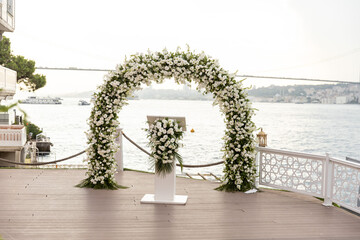 White Floral Wedding Arch with Bosphorus Bridge View