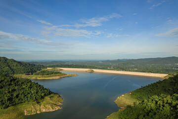 Aerial view of beautiful natural scenery of river in southeast asia tropical green forest and mountains in Thailand.