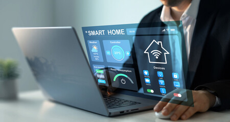 Technology assistant for smart devices,intelligent house or smart home technology.Business person using digital dashboard of smart home app for control home appliances. 