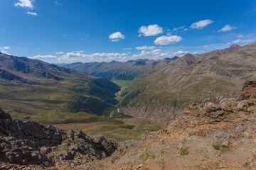 Aerial summer boundless panorama of alpine valley. Vallelunga, Alto Adige Sudtirol, Italy