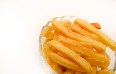 French fries in a glass cup. Fried potato.