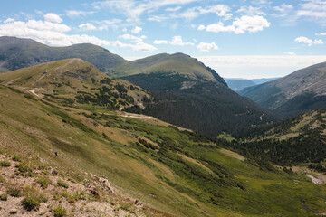 Looking eastward from the Alpine Visitor Center, in Rocky Mountain National Park, Colorado in mid-August, with the one-way up Fall River Road traversing the mountain below