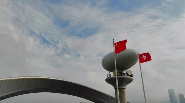 Kai tak Cruise terminal park, Chinese and Hong Kong flags with sky background.