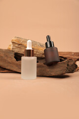 Frosted and Amber Dropper Bottles on Wood PSD Template